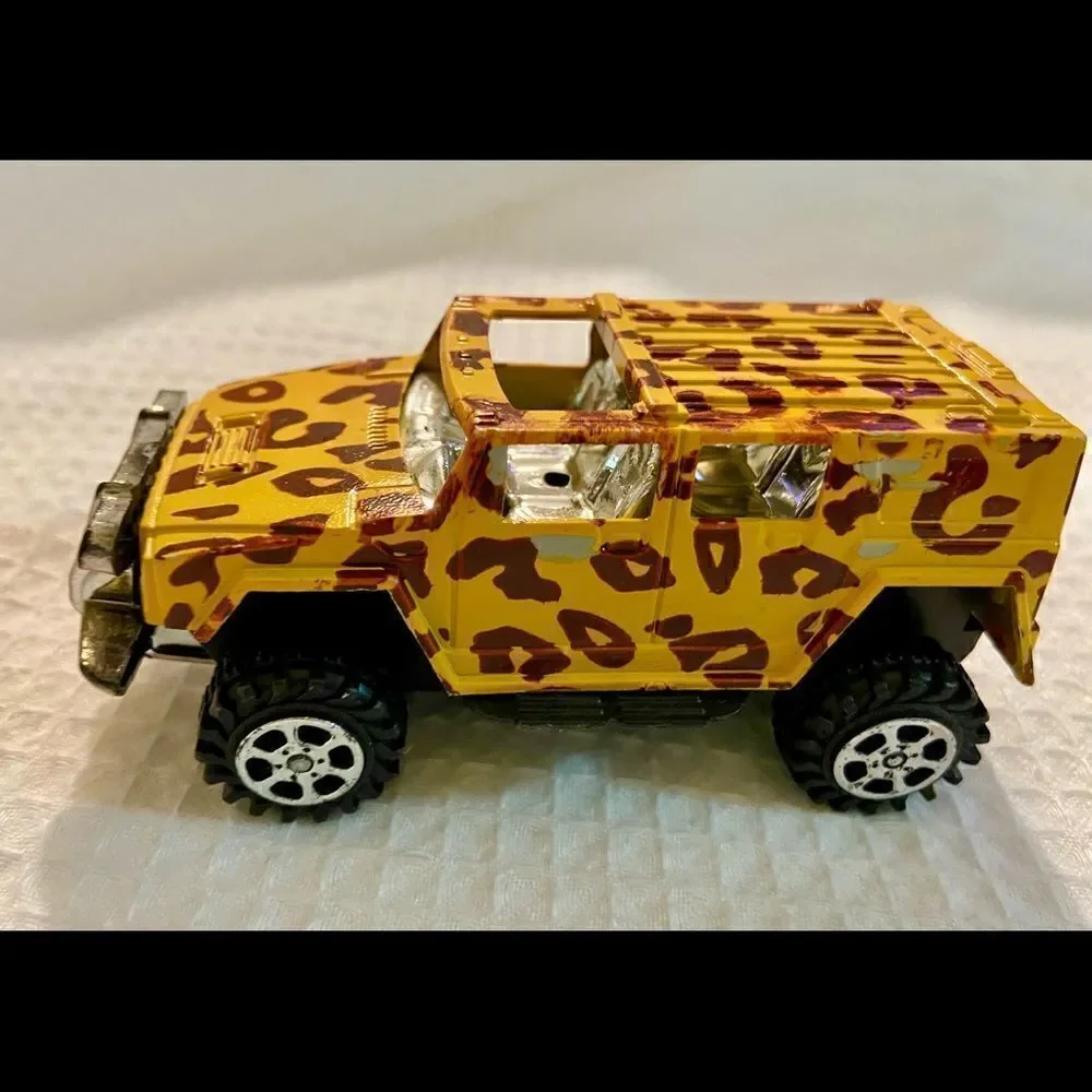 Vintage Lot Of 3 Toy 4 X 4 Trucks W Animal Prints Good Condition Unbranded.
